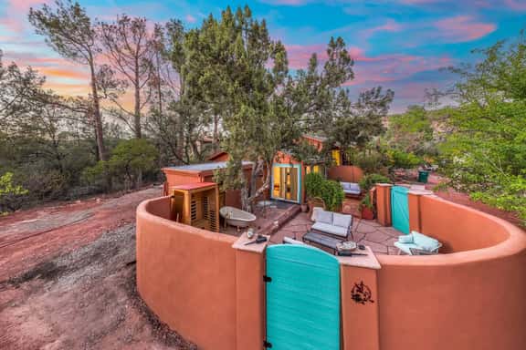 The adobe-style patio is my favorite part! Soak under the stars in the epic cast iron clawfoot tub with a view of cathedral rock, enjoy an evening dinner around the fire, or take an outdoor shower after a long hike.