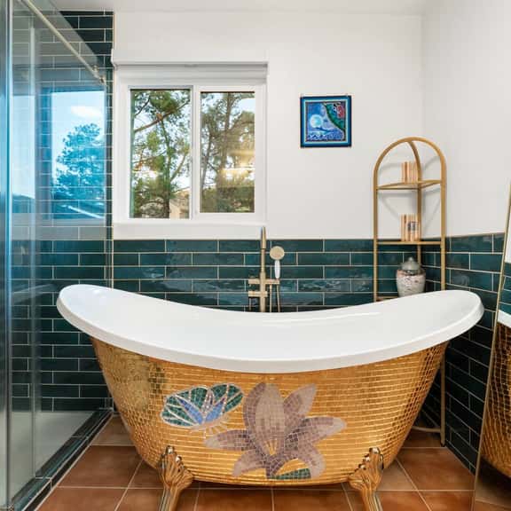 Enjoy a luxurious soak after a long hike! We fully remodeled this bathroom to enjoy as a couple with a walk-in shower with two shower heads, custom clawfoot tub, and beautiful artwork from one of our favorite Huichol visionary artists.